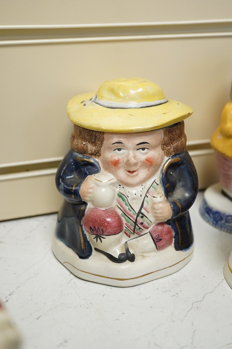 A large collection of English pottery cow creamers, Staffordshire figures and cruets a blue and white teapot and sponge ware dish-34cm diameter, (26)